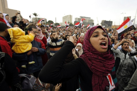 Protesters chant anti-government slogans during demonstrations at Tahrir Square in Cairo
